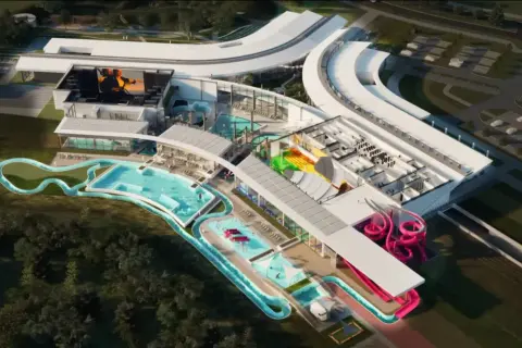 Nowoczesny aquapark Rzeszów z basenami, zjeżdżalniami i strefą relaksu. Widok z lotu ptaka na kompleks wodny.